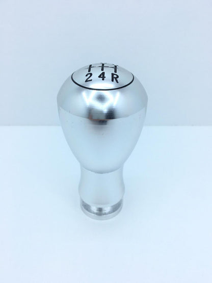 Pomo de palanca de cambios de metal universal con aspecto deportivo, tipo redondo, plateado, con accesorio